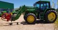 Tractor Jonh Deere 6410 con pala Frontal