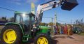 Tractor John Deere 6400 con pala frontal