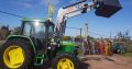 Tractor John Deere 6400 con pala frontal