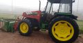 John Deere 2250 con pala Frontal Mailleux