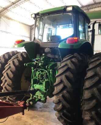 Tractor usado John Deere 7515 con piloto