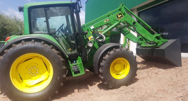 Tractor John Deere 6330 con pala frontal JD631