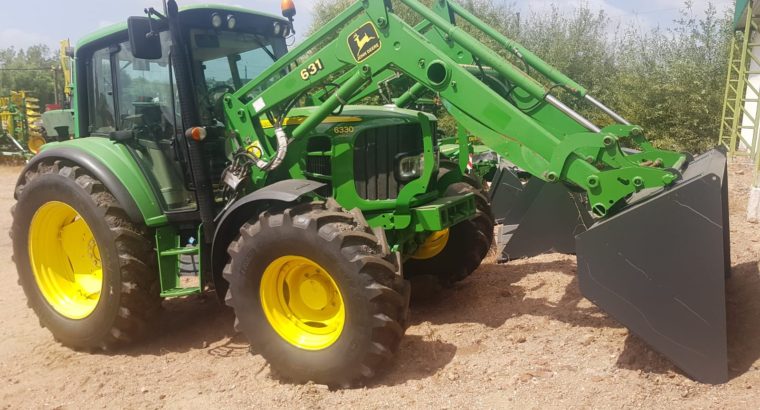 Tractor John Deere 6330 con pala frontal JD631