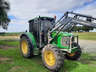 Tractor John Deere 6220 con cargador